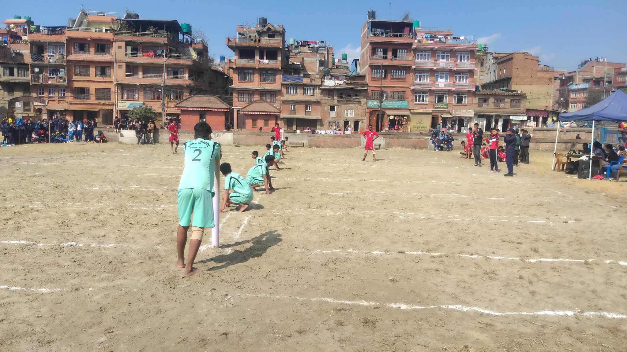 भक्तपुरको लामगालमा खोखो खेलमा विद्यार्थी (फोटो कथा)